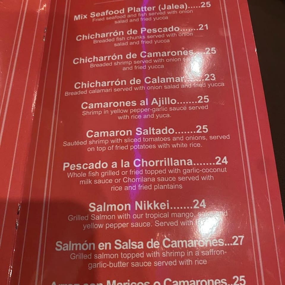 A red restaurant menu displays a variety of seafood dishes and their prices.