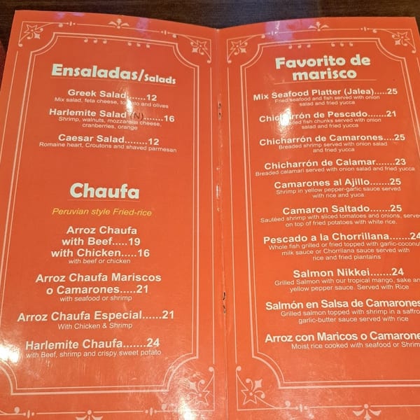 An orange menu displays Peruvian Chaufa, salads, and seafood dishes with prices.