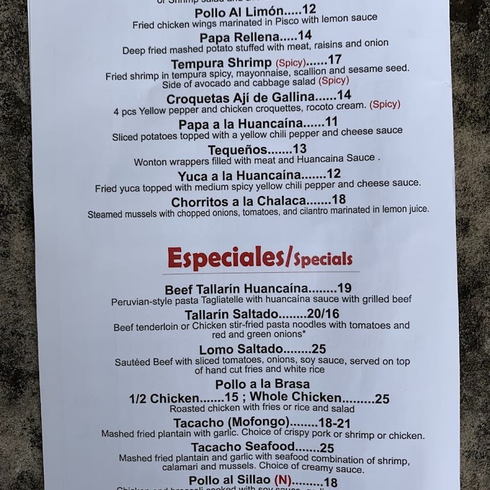 A white paper menu displays a list of Peruvian appetizers and specials with descriptions and prices.