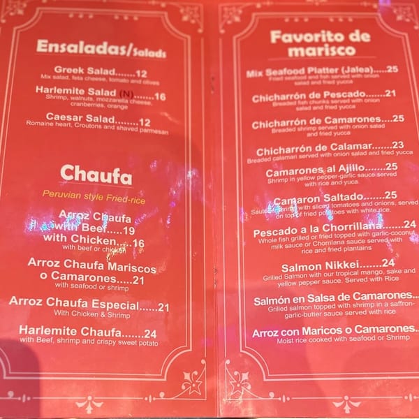 A red restaurant menu displays Peruvian salads, fried rice, and seafood dishes with prices.