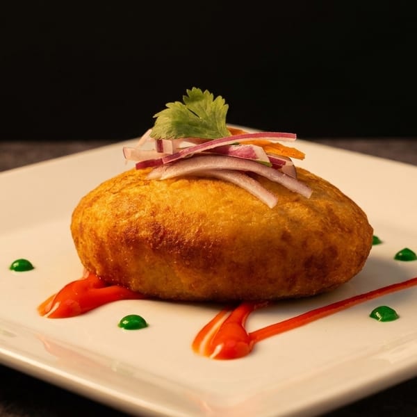 Peruvian papa rellena potato croquette with aji sauce at Harlemite NYC